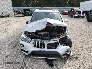 2017 BMW X1 sDrive28i with VIN WBXHU7C30H5H37516, listed as a Copart auction lot 68677332 with 0 mi miles. Bid and sale history available at carsss.com. Image 5.