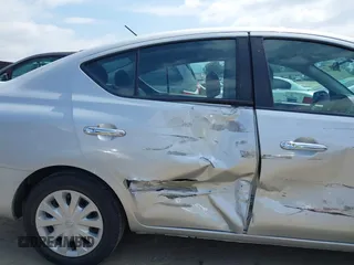 2019 Nissan Versa SV z VIN 3N1CN7AP7KL804002, wystawiony jako IAAI lot #42134636 z przebiegiem 75 107 mil mil oraz . Historia ofert i sprzedaży dostępna na DreamBid. Obrazek 12.