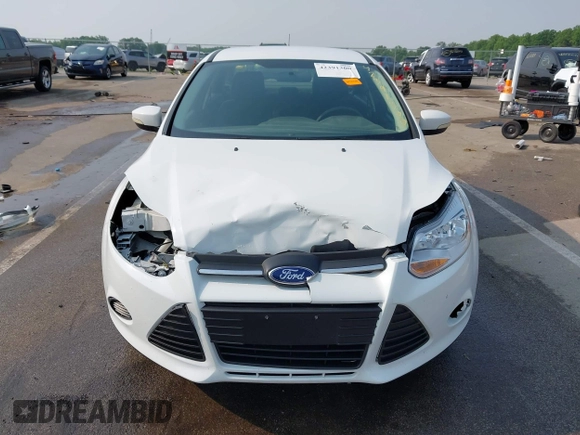 2013 Ford Focus SE с VIN 1FADP3F29DL309581, выставлен на аукционе IAAI как лот 42391300 с пробегом 280 531 миль миль и . История ставок и продаж доступна на DreamBid. Изображение 13.