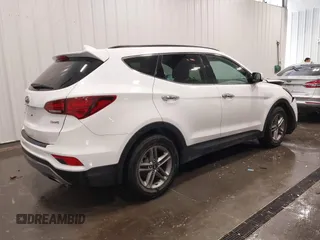 2017 Hyundai Santa Fe 2.4L z VIN 5XYZU3LBXHG444308, wystawiony jako IAAI lot #41685902 z przebiegiem 70 838 mil mil oraz . Historia ofert i sprzedaży dostępna na DreamBid. Obrazek 4.