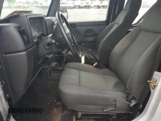 2006 Jeep Wrangler SE with VIN 1J4FA29166P739480, listed as a Copart auction lot 76320934 with 139,542 mi miles and Salvage Title. Bid and sale history available at carsss.com. Image 7.