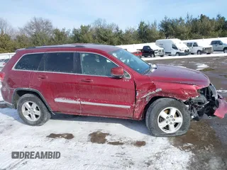 2013 Jeep Grand Cherokee Laredo with VIN 1C4RJFAG4DC572986, listed as a IAAI auction lot 41586820 with 100,899 mi miles. Bid and sale history available at carsss.com. Image 14.