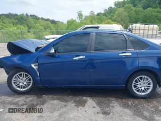 2008 Ford Focus SE z VIN 1FAHP35N38W110236, wystawiony jako IAAI lot #42055686 z przebiegiem 199 602 mil mil oraz . Historia ofert i sprzedaży dostępna na DreamBid. Obrazek 15.