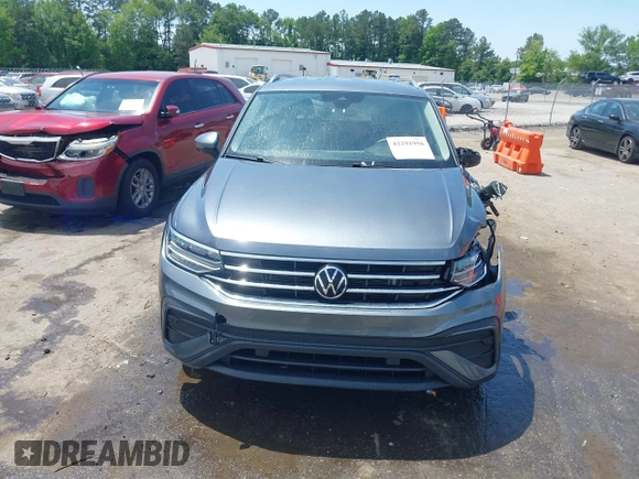 2023 Volkswagen Tiguan SE with VIN 3VV3B7AX3PM118743, listed as a IAAI auction lot 42291956 with 32,776 mi miles and . Bid and sale history available at DreamBid. Image 12.