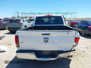 2021 Ram 1500 SLT with VIN 1C6RR6TTXMS517345, listed as a IAAI auction lot 42314123 with 107,307 mi miles and . Bid and sale history available at DreamBid. Image 16.