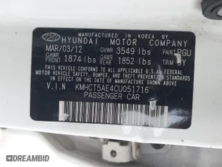2012 Hyundai Accent GS with VIN KMHCT5AE4CU051716, listed as a IAAI auction lot 41692287 with 173,861 mi miles. Bid and sale history available at carsss.com. Image 9.