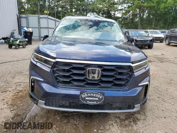 2024 Honda Pilot EX-L 7 Passenger with VIN 5FNYG2H56RB004448, listed as a Copart auction lot 67751694 with 7,356 mi miles and Salvage Title. Bid and sale history available at carsss.com. Image 5.