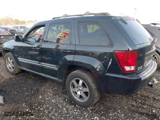 2009 Jeep Grand Cherokee Laredo with VIN 1J8GR48K29C552248, listed as a IAAI auction lot 41209184 with 194,778 mi miles. Bid and sale history available at carsss.com. Image 3.