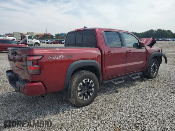 2022 Nissan Frontier Pro-4X with VIN 1N6ED1EK1NN601886, listed as a Copart auction lot 65182295 with 51,879 mi miles and Salvage title. Bid and sale history available at DreamBid. Image 3.