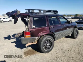 1997 Jeep Grand Cherokee Laredo with VIN 1J4GZ58Y3VC653093, listed as a Copart auction lot 79576964 with 0 mi miles and Salvage Title. Bid and sale history available at carsss.com. Image 3.