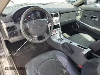 2004 Chrysler Crossfire z VIN 1C3AN69LX4X023972, wystawiony jako Copart lot #49111475 z przebiegiem 208 710 mil mil oraz Szkoda całkowita • Salvage title. Historia ofert i sprzedaży dostępna na DreamBid. Obrazek 8.