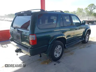 2000 Toyota 4Runner SR5 with VIN JT3GN86R9Y0153027, listed as a IAAI auction lot 42068029 with 188,171 mi miles and . Bid and sale history available at DreamBid. Image 4.