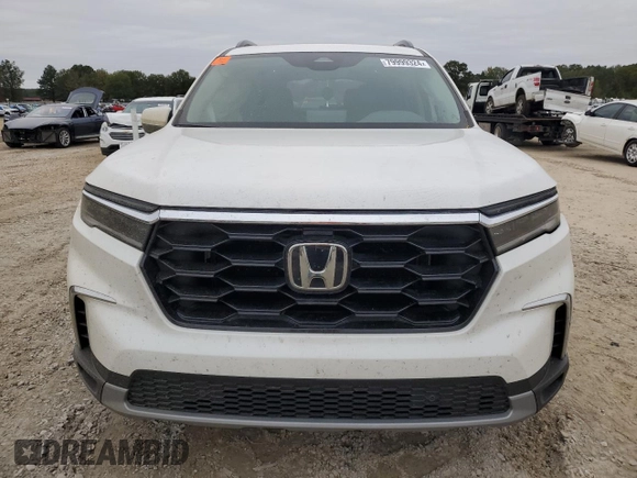 2024 Honda Pilot Touring z VIN 5FNYG2H74RB011187, wystawiony jako Copart lot #79999324 z przebiegiem 16 123 mil mil oraz Szkoda całkowita • Salvage title. Historia ofert i sprzedaży dostępna na DreamBid. Obrazek 5.