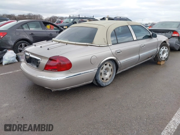 2001 Lincoln Continental with VIN 1LNHM97VX1Y627039, listed as a IAAI auction lot 41482016 with 143,317 mi miles and . Bid and sale history available at DreamBid. Image 4.
