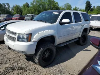 2012 Chevrolet Tahoe LT with VIN 1GNSKBE0XCR145917, listed as a Copart auction lot 61267485 with 184,416 mi miles and Salvage title. Bid and sale history available at DreamBid. Image 1.