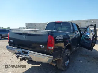 1999 Ford F-150 XL with VIN 1FTRX18L3XKA77743, listed as a IAAI auction lot 42512532 with Not provided miles and . Bid and sale history available at DreamBid. Image 4.
