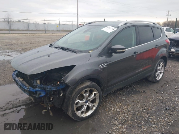 2015 Ford Escape Titanium with VIN 1FMCU9J94FUB49236, listed as a IAAI auction lot 42117378 with 112,267 mi miles. Bid and sale history available at carsss.com. Image 2.
