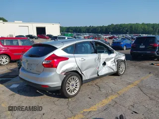 2014 Ford Focus Electric with VIN 1FADP3R43EL353378, listed as a IAAI auction lot 42555423 with 58,114 mi miles and . Bid and sale history available at DreamBid. Image 4.