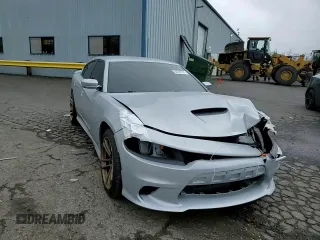 2020 Dodge Charger R/T z VIN 2C3CDXCT6LH106683, wystawiony jako Copart lot #50390175 z przebiegiem 87 789 mil mil oraz Szkoda całkowita • Salvage title. Historia ofert i sprzedaży dostępna na DreamBid. Obrazek 10.