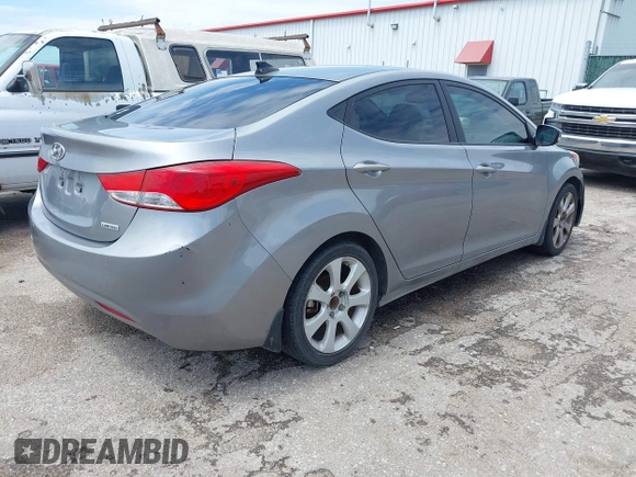 2012 Hyundai Elantra Limited with VIN KMHDH4AE5CU369859, listed as a IAAI auction lot 42095240 with 174,486 mi miles. Bid and sale history available at carsss.com. Image 4.