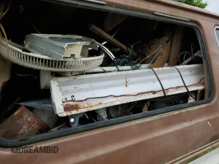 1990 Ford Econoline Wagon XL z VIN 1FBJS31H0LHB33372, wystawiony jako Copart lot #82614224 z przebiegiem Nie podano mil oraz Nie do naprawy • Non repairable. Historia ofert i sprzedaży dostępna na DreamBid. Obrazek 10.