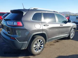 2020 Jeep Cherokee Latitude Plus with VIN 1C4PJLLB8LD535701, listed as a IAAI auction lot 41160714 with 102,529 mi miles. Bid and sale history available at carsss.com. Image 4.