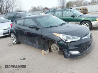 2013 Hyundai Veloster w/Black Int with VIN KMHTC6AD8DU155575, listed as a IAAI auction lot 41722849 with 100,204 mi miles and . Bid and sale history available at DreamBid. Image 1.