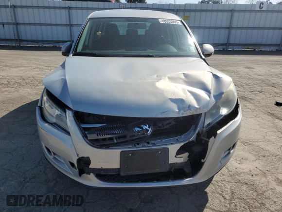 2010 Volkswagen Tiguan S with VIN WVGAV7AX9AW519312, listed as a Copart auction lot 48633055 with 94,740 mi miles and Salvage title. Bid and sale history available at DreamBid. Image 5.