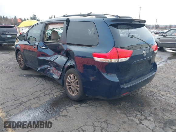 2011 Toyota Sienna XLE AAS with VIN 5TDYK3DCXBS113103, listed as a IAAI auction lot 41505972 with 170,919 mi miles and . Bid and sale history available at DreamBid. Image 3.