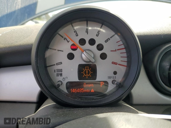 2012 MINI Hardtop with VIN WMWSU3C53CT257126, listed as a Copart auction lot 52146465 with 146,485 mi miles and Salvage Title. Bid and sale history available at DreamBid. Image 9.