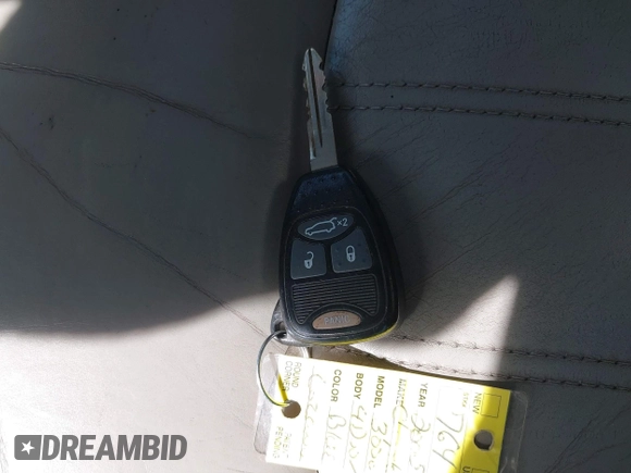 2005 Chrysler 300 C with VIN 2C3JA63HX5H124452, listed as a IAAI auction lot 41877404 with 93,972 mi miles and . Bid and sale history available at DreamBid. Image 11.