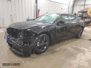 2022 Dodge Charger SXT with VIN 2C3CDXJGXNH203619, listed as a Copart auction lot 84207854 with 60,002 mi miles and Salvage Title. Bid and sale history available at carsss.com. Image 1.