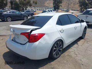 2017 Toyota Corolla L with VIN 5YFBURHE3HP610414, listed as a IAAI auction lot 42410369 with 157,908 mi miles and . Bid and sale history available at DreamBid. Image 4.