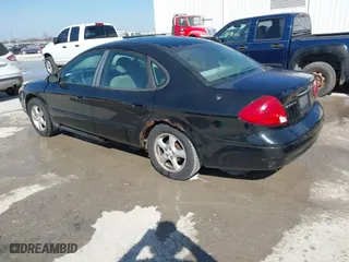 2003 Ford Taurus SE Standard with VIN 1FAFP53U23G219786, listed as a IAAI auction lot 41799874 with 172,128 mi miles. Bid and sale history available at carsss.com. Image 3.