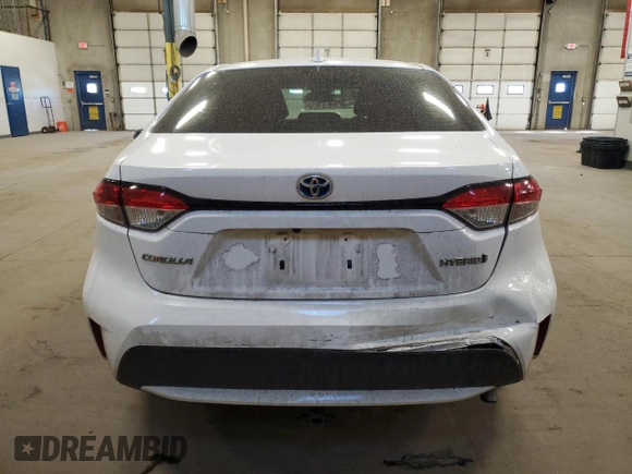 2021 Toyota Corolla Hybrid LE with VIN JTDEAMDE4MJ002382, listed as a Copart auction lot 50318865 with 74,385 mi miles and Salvage Title. Bid and sale history available at carsss.com. Image 6.