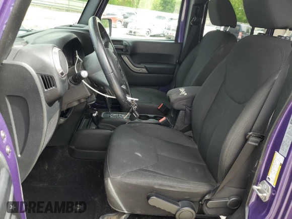 2018 Jeep Wrangler Unlimited Sport with VIN 1C4BJWDG9JL910410, listed as a Copart auction lot 56561955 with 57,450 mi miles and Salvage title. Bid and sale history available at DreamBid. Image 7.