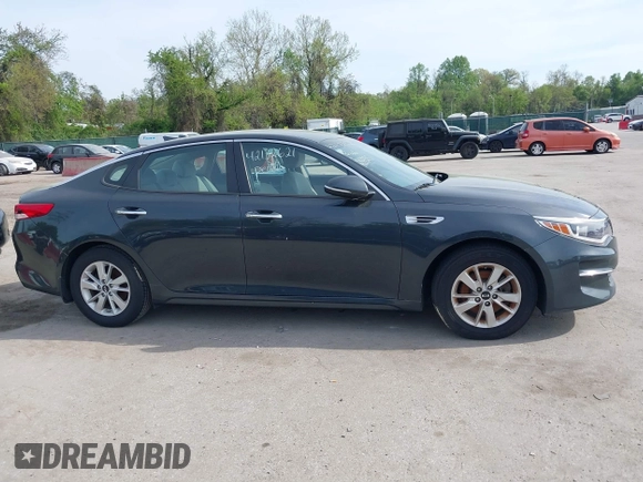2016 Kia Optima LX with VIN KNAGT4L37G5073752, listed as a IAAI auction lot 42132621 with 136,818 mi miles. Bid and sale history available at carsss.com. Image 13.