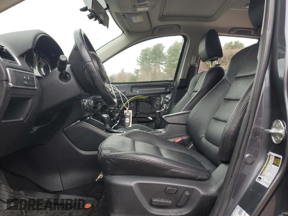 2016 Mazda CX-5 Grand Touring with VIN JM3KE4DY6G0834583, listed as a Copart auction lot 52015905 with 184,741 mi miles and Salvage Title. Bid and sale history available at DreamBid. Image 7.