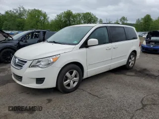 2011 Volkswagen Routan SE z VIN 2V4RW3DG8BR668268, wystawiony jako Copart lot #57986125 z przebiegiem 81 291 mil mil oraz Czysty tytuł • Clean title. Historia ofert i sprzedaży dostępna na DreamBid. Obrazek 1.