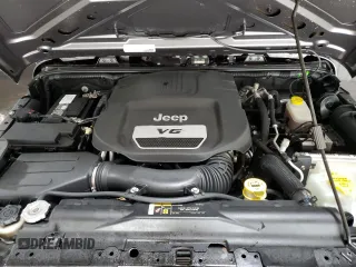 2017 Jeep Wrangler Sport z VIN 1C4AJWAG4HL726714, wystawiony jako Copart lot #57462995 z przebiegiem 34 940 mil mil oraz Szkoda całkowita • Salvage title. Historia ofert i sprzedaży dostępna na DreamBid. Obrazek 11.