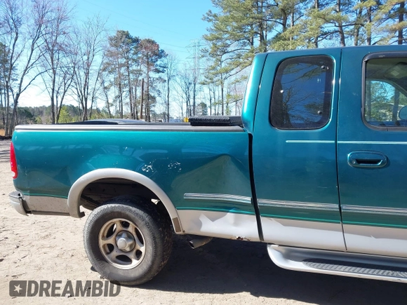 1997 Ford F-150 XL with VIN 1FTDX1860VNA37152, listed as a IAAI auction lot 41713372 with 200,777 mi miles. Bid and sale history available at carsss.com. Image 12.