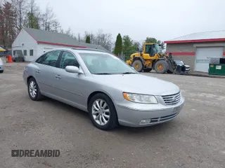 2006 Hyundai Azera SE with VIN KMHFC46F46A077702, listed as a IAAI auction lot 42088782 with 103,033 mi miles and . Bid and sale history available at DreamBid. Image 1.