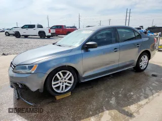2015 Volkswagen Jetta S with VIN 3VW2K7AJ8FM242136, listed as a Copart auction lot 61063545 with Not provided miles and Salvage title. Bid and sale history available at DreamBid. Image 1.