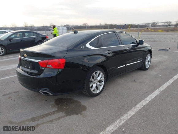 2014 Chevrolet Impala LTZ with VIN 2G1155S31E9211885, listed as a IAAI auction lot 41804249 with 149,066 mi miles. Bid and sale history available at carsss.com. Image 4.