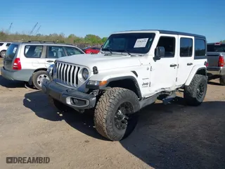 2019 Jeep Wrangler Unlimited Sahara with VIN 1C4HJXEN2KW591557, listed as a IAAI auction lot 41962034 with 88,691 mi miles. Bid and sale history available at carsss.com. Image 17.