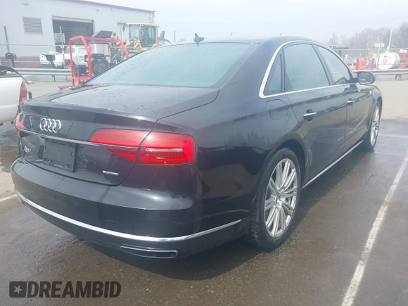 2015 Audi A8 3.0T with VIN WAU3GAFD7FN037726, listed as a IAAI auction lot 41793699 with 100,773 mi miles and . Bid and sale history available at DreamBid. Image 4.
