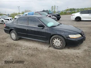 2001 Honda Accord LX z VIN 1HGCG56401A047218, wystawiony jako Copart lot #55053285 z przebiegiem 214 849 mil mil oraz Szkoda całkowita • Salvage title. Historia ofert i sprzedaży dostępna na DreamBid. Obrazek 4.