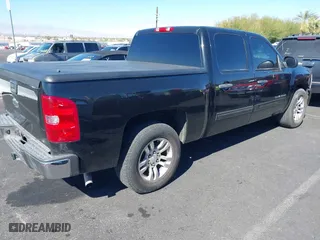 2009 Chevrolet Silverado 1500 LS with VIN 2GCEC13C591133184, listed as a IAAI auction lot 41656109 with 129,510 mi miles. Bid and sale history available at carsss.com. Image 4.
