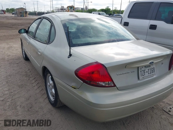 2006 Ford Taurus SE with VIN 1FAFP53U16A221651, listed as a IAAI auction lot 42065261 with 159,411 mi miles. Bid and sale history available at carsss.com. Image 3.