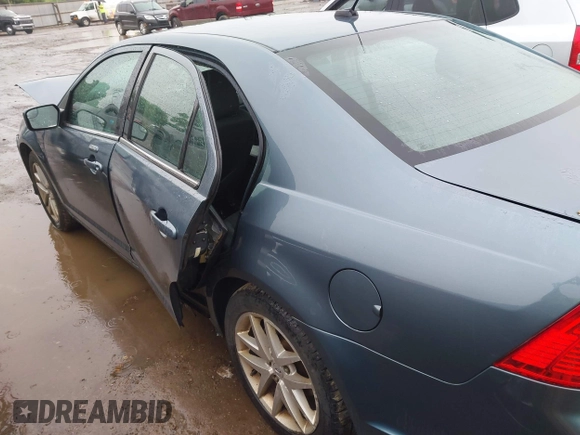 2012 Ford Fusion SEL z VIN 3FAHP0JG5CR171928, wystawiony jako IAAI lot #42356521 z przebiegiem Nie podano mil oraz . Historia ofert i sprzedaży dostępna na DreamBid. Obrazek 14.